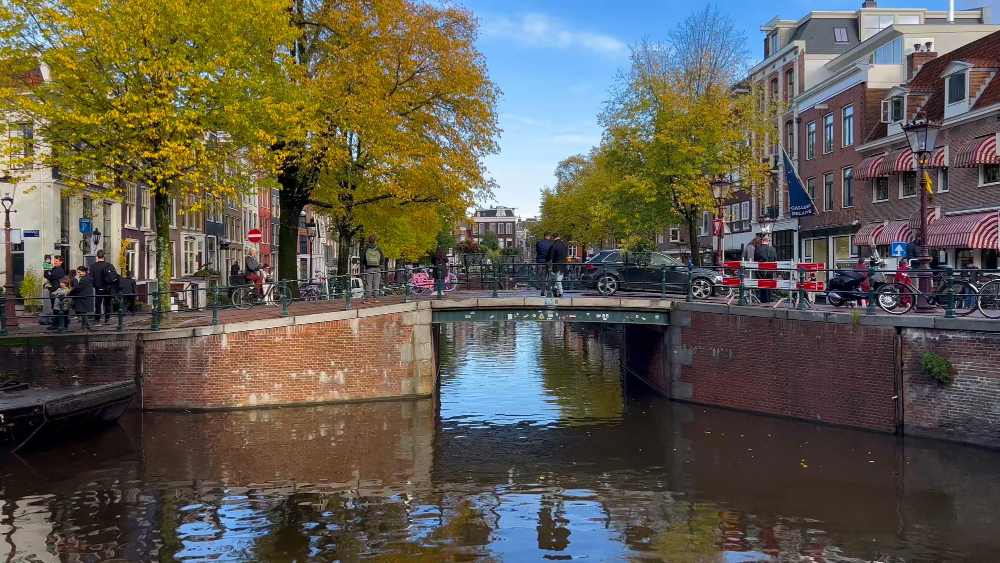 canal side journey through amsterdam
